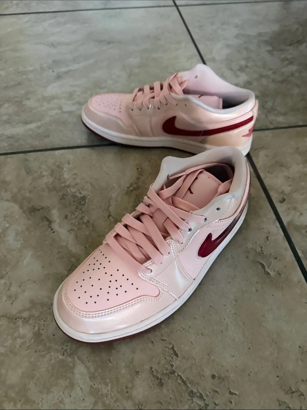 Nike Women’s Low-Top Sneakers in Light Pink with Burgundy Swoosh